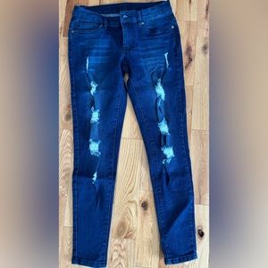 Venus jeans - Dark jeans with rips and patterned jeans that are reversible.